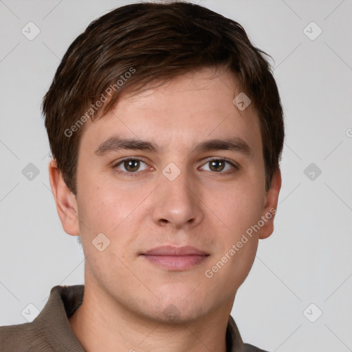 Neutral white young-adult male with short  brown hair and brown eyes