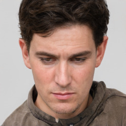 Neutral white adult male with short  brown hair and brown eyes