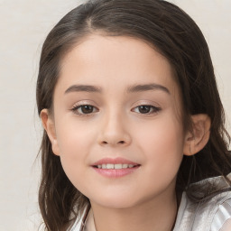 Joyful white child female with medium  brown hair and brown eyes