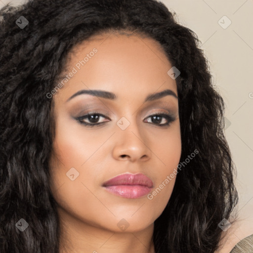 Joyful latino young-adult female with long  brown hair and brown eyes