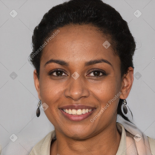 Joyful black young-adult female with short  black hair and brown eyes