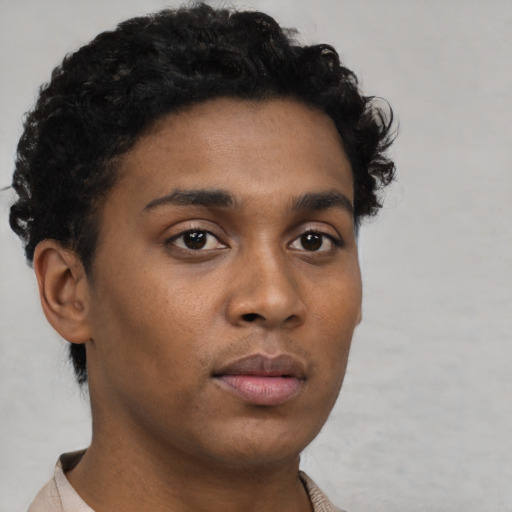 Neutral black young-adult male with short  brown hair and brown eyes