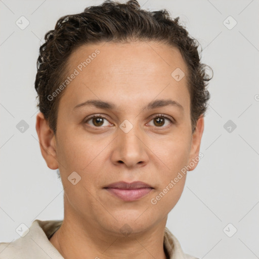 Joyful white adult female with short  brown hair and brown eyes