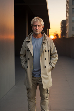 Uruguayan middle-aged male with  blonde hair