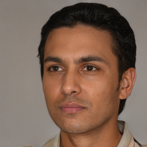 Neutral latino young-adult male with short  black hair and brown eyes
