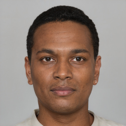 Neutral black young-adult male with short  black hair and brown eyes