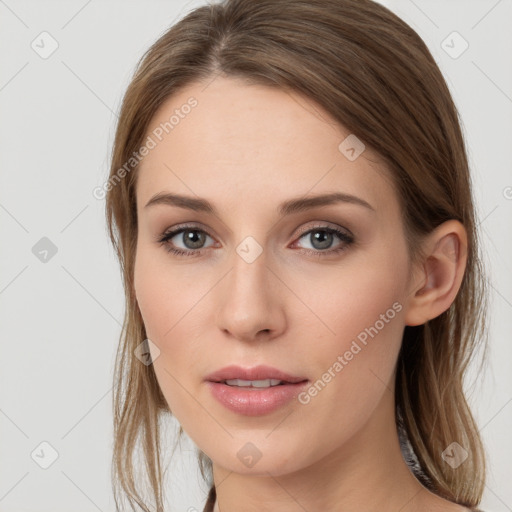 Neutral white young-adult female with medium  brown hair and grey eyes