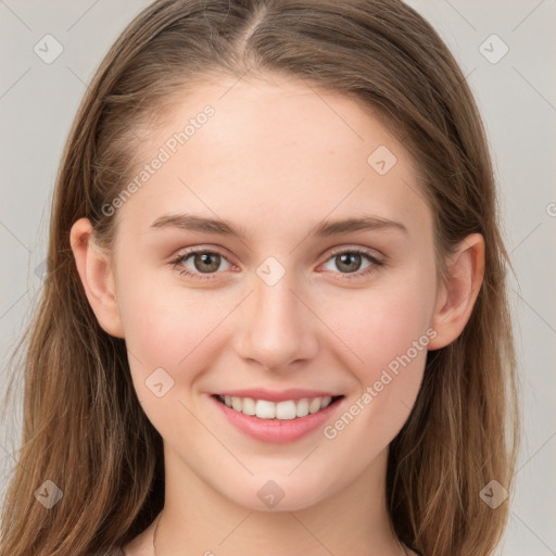 Joyful white young-adult female with long  brown hair and grey eyes