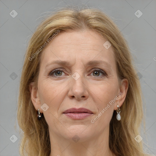 Joyful white adult female with long  brown hair and grey eyes