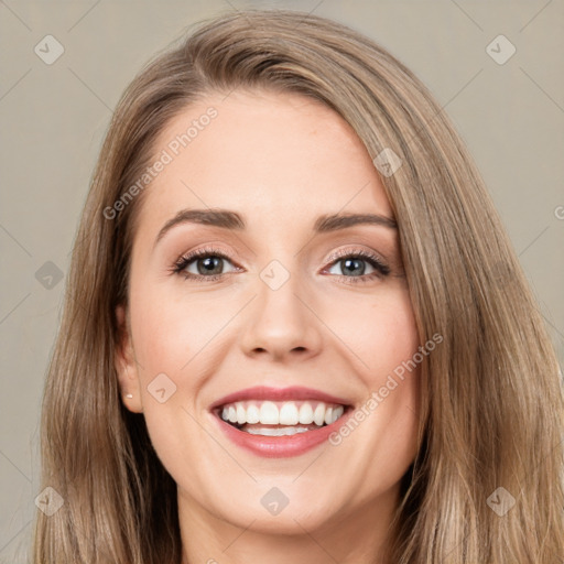 Joyful white young-adult female with long  brown hair and grey eyes