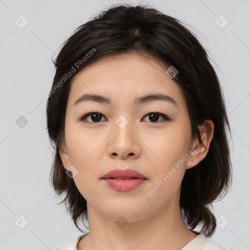 Neutral asian young-adult female with medium  brown hair and brown eyes