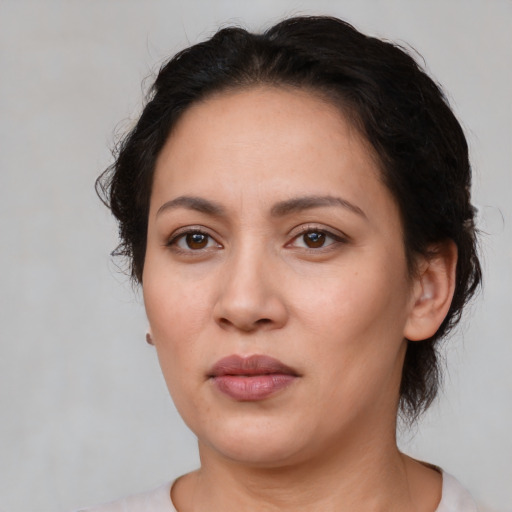 Neutral white young-adult female with medium  black hair and brown eyes