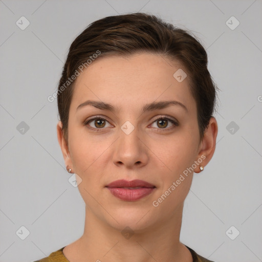 Joyful white young-adult female with short  brown hair and brown eyes