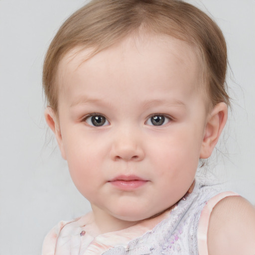 Neutral white child female with short  brown hair and blue eyes