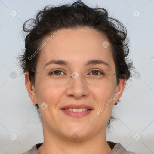 Joyful white adult female with short  brown hair and brown eyes