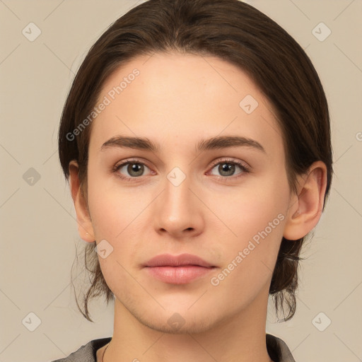 Neutral white young-adult female with medium  brown hair and brown eyes