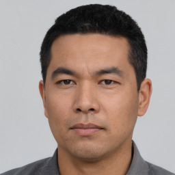 Neutral asian young-adult male with short  black hair and brown eyes