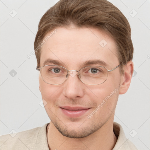 Joyful white adult male with short  brown hair and grey eyes