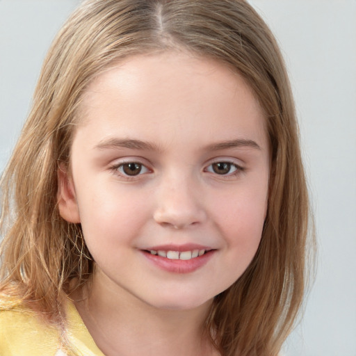 Joyful white child female with long  brown hair and brown eyes