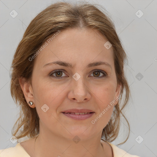 Joyful white adult female with medium  brown hair and brown eyes