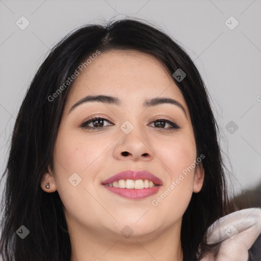 Joyful asian young-adult female with long  brown hair and brown eyes