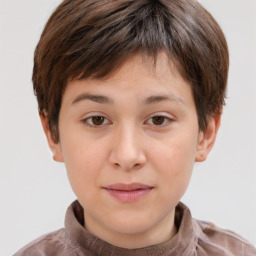 Joyful white child male with short  brown hair and brown eyes