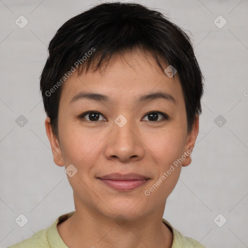 Joyful asian young-adult female with short  brown hair and brown eyes