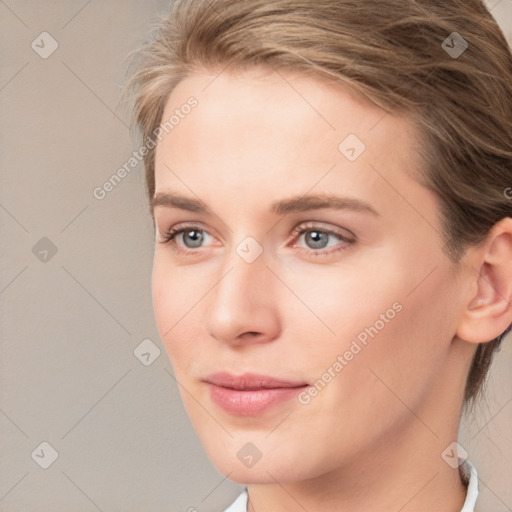 Joyful white young-adult female with medium  brown hair and blue eyes