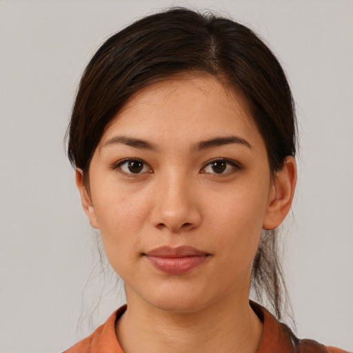 Neutral white young-adult female with short  brown hair and brown eyes