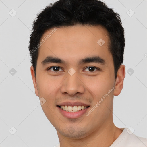 Joyful white young-adult male with short  black hair and brown eyes