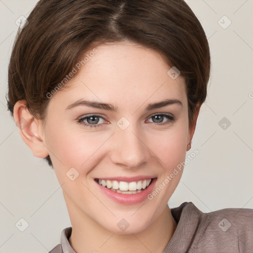 Joyful white young-adult female with short  brown hair and grey eyes