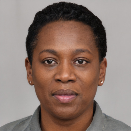 Neutral black adult female with short  black hair and brown eyes