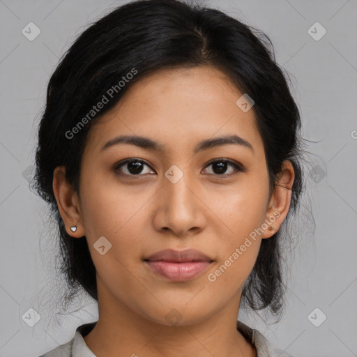 Joyful latino young-adult female with medium  black hair and brown eyes