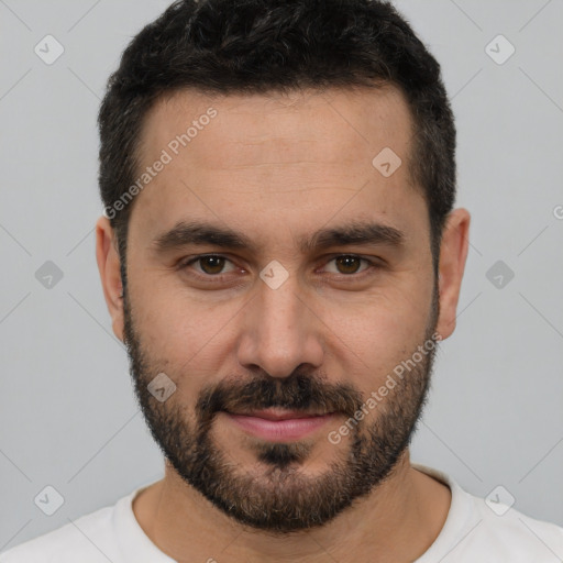 Joyful white young-adult male with short  brown hair and brown eyes