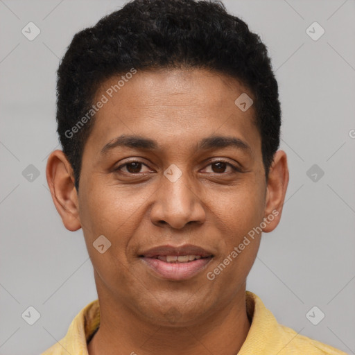 Joyful latino young-adult male with short  brown hair and brown eyes