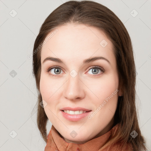 Joyful white young-adult female with long  brown hair and grey eyes