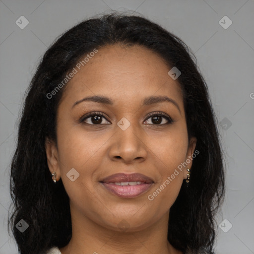 Joyful latino young-adult female with long  brown hair and brown eyes