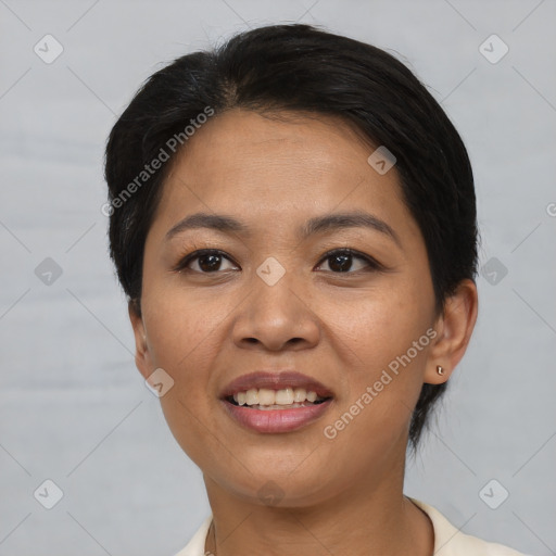 Joyful asian young-adult female with short  brown hair and brown eyes