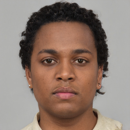 Neutral black young-adult male with short  brown hair and brown eyes