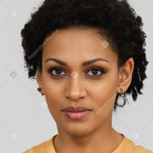 Joyful black young-adult female with short  black hair and brown eyes