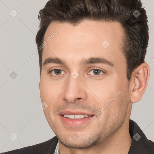 Joyful white young-adult male with short  brown hair and brown eyes