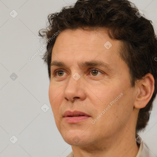 Neutral white adult male with short  brown hair and brown eyes