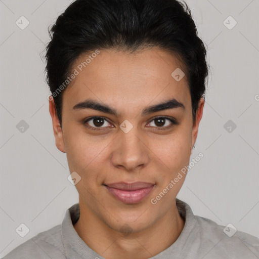 Joyful latino young-adult female with short  black hair and brown eyes