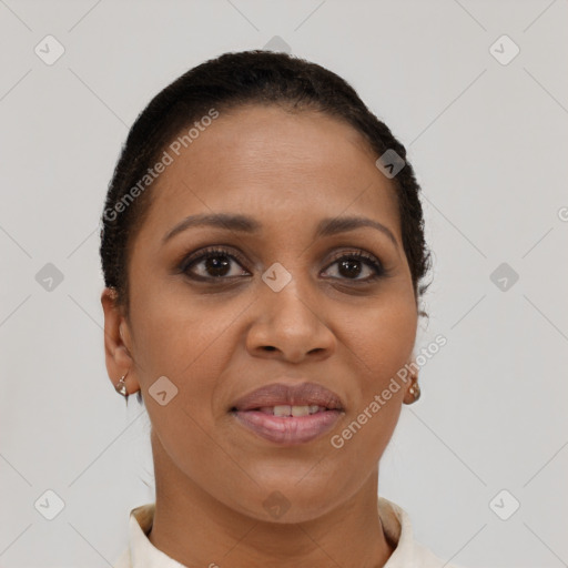 Joyful black young-adult female with short  brown hair and brown eyes