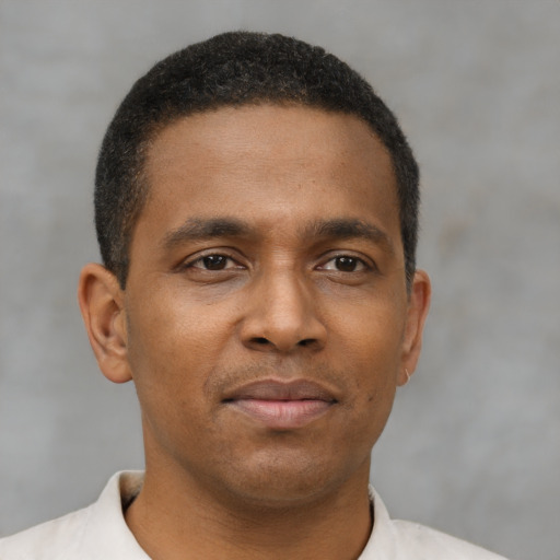Neutral latino young-adult male with short  brown hair and brown eyes