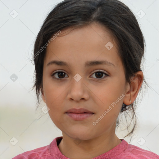 Joyful white child female with medium  brown hair and brown eyes