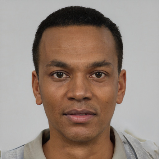 Neutral black young-adult male with short  black hair and brown eyes