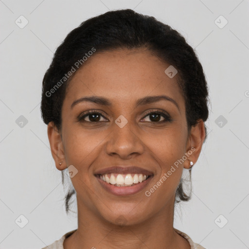 Joyful latino young-adult female with short  brown hair and brown eyes