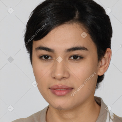 Joyful latino young-adult female with short  brown hair and brown eyes