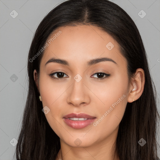 Joyful latino young-adult female with long  brown hair and brown eyes